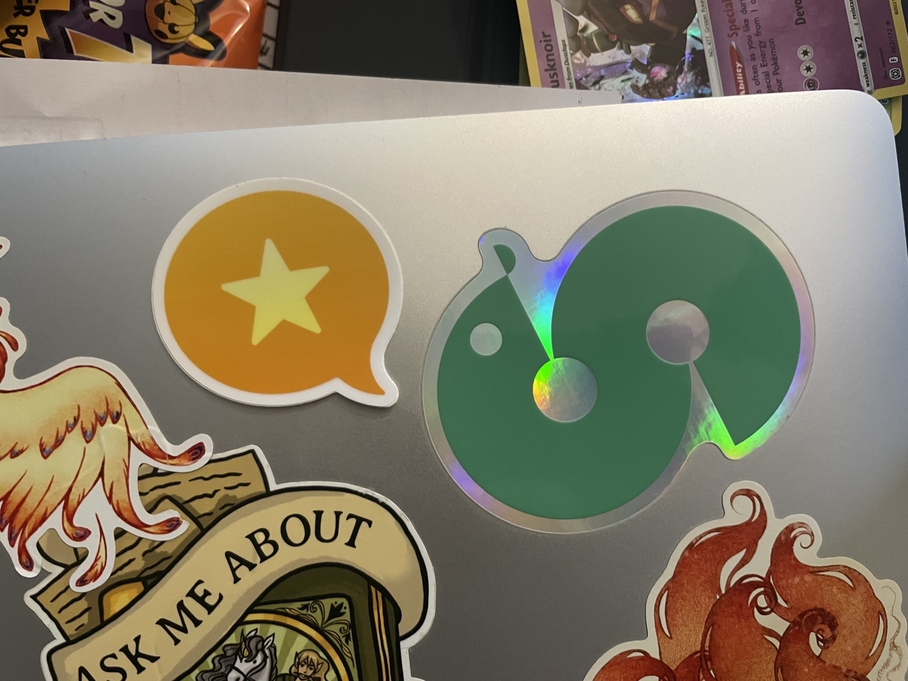A Micro-dot-blog sticker on top of a laptop next to a Smolblog sticker