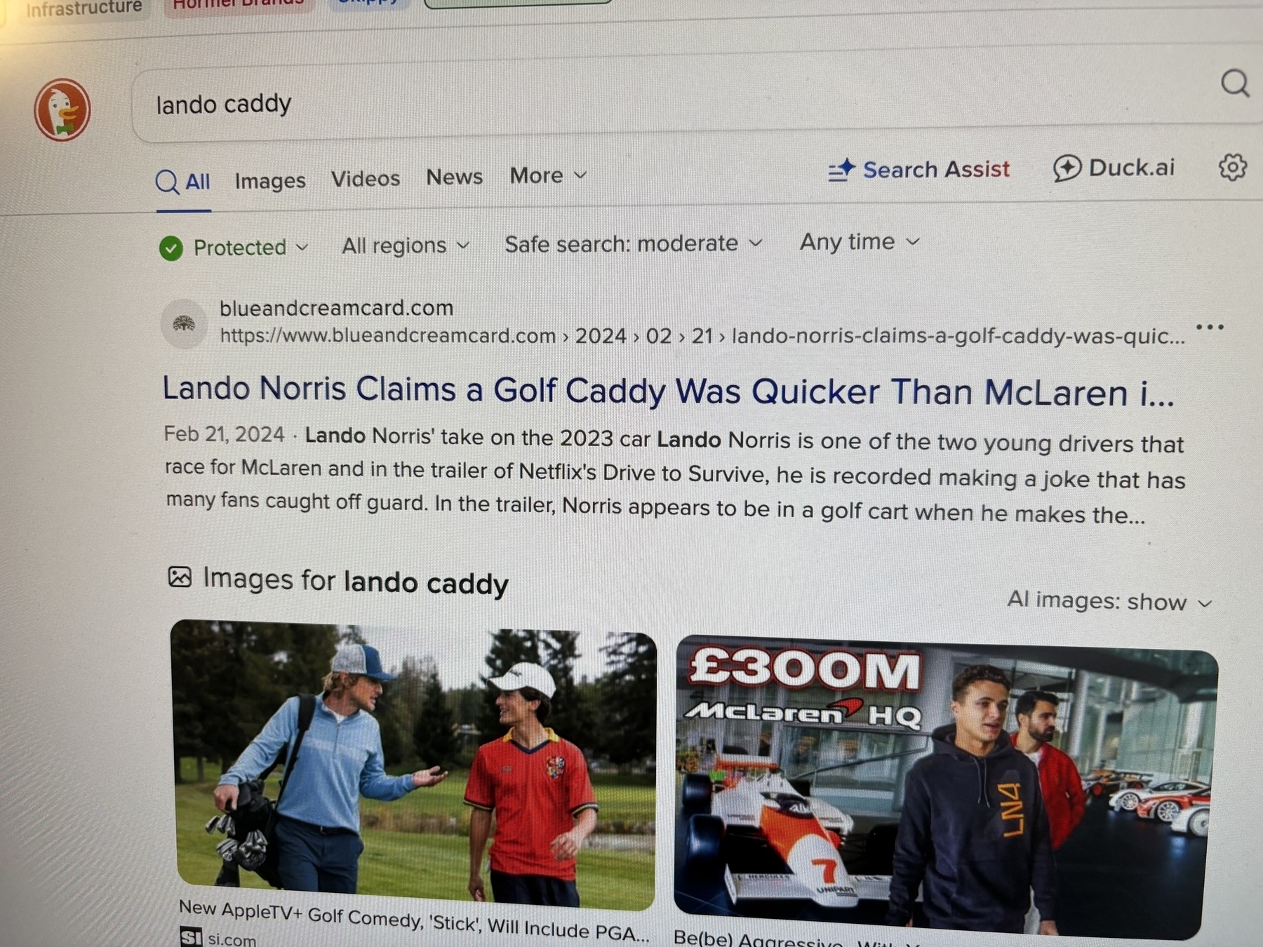 Photo of a DuckDuckGo web search for “lando caddy” with the results being stories about the Formula One driver Lando Norris and a golf caddy.